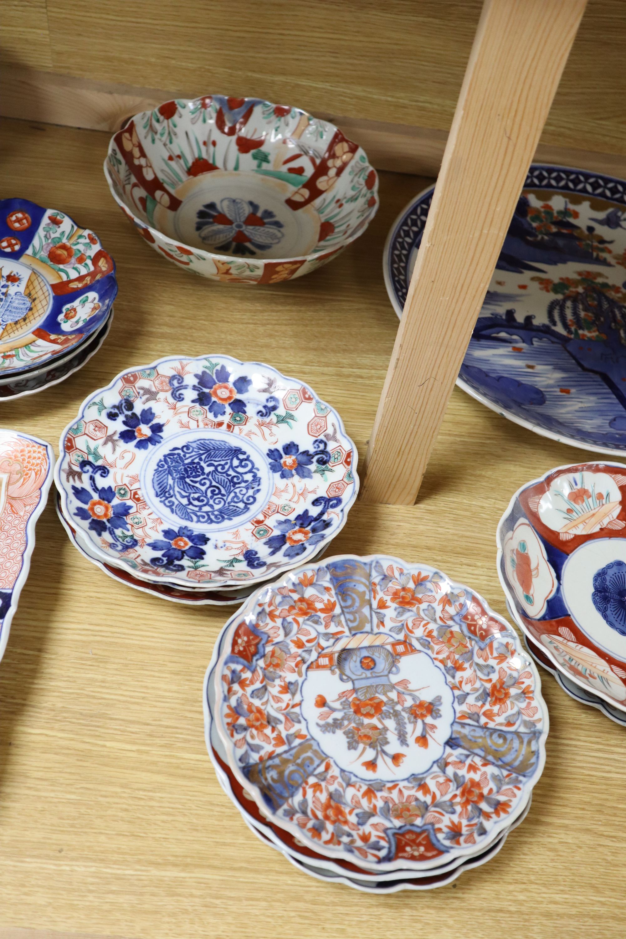 A collection of Japanese Imari dishes, bowls and a large square dish